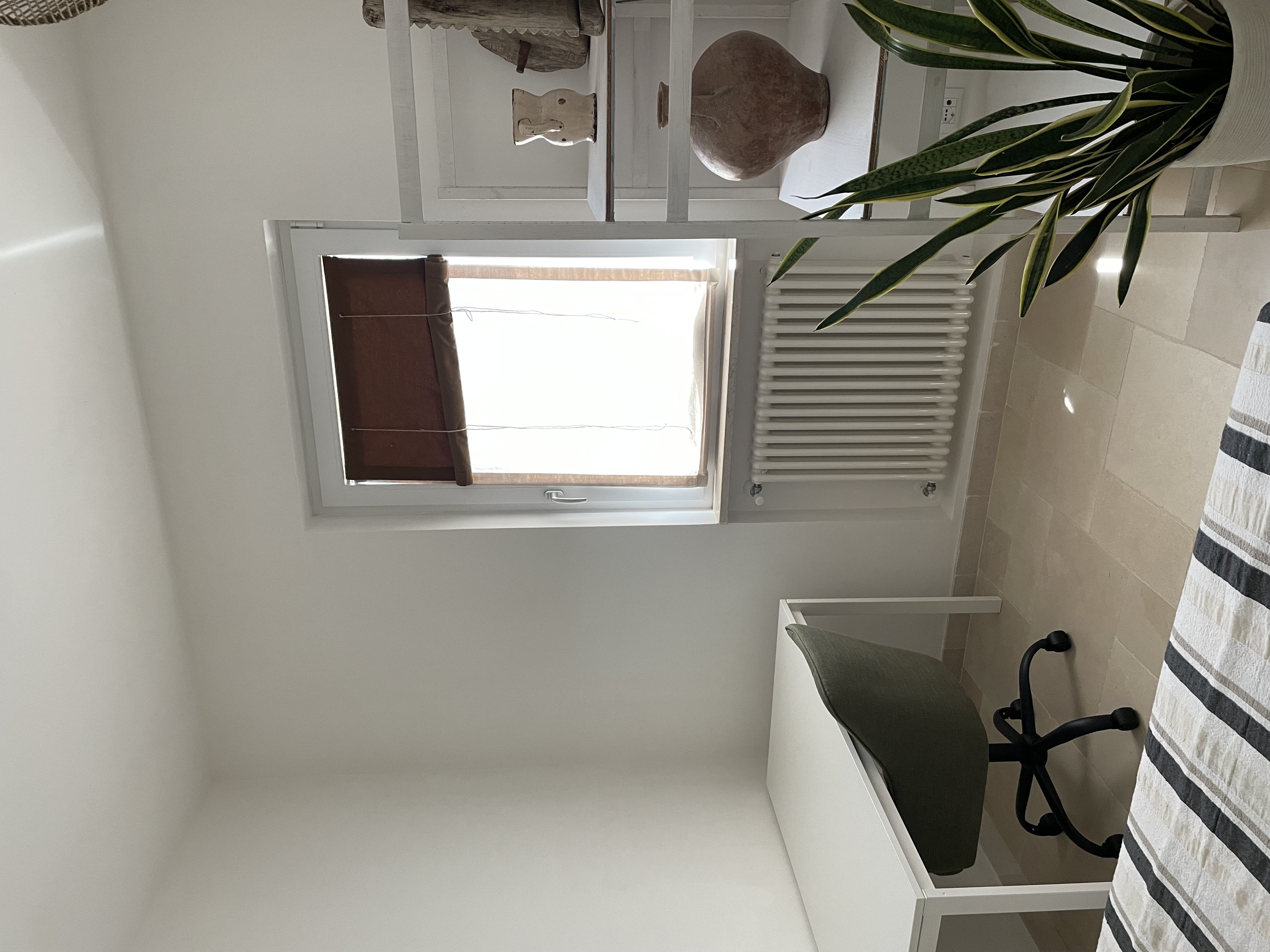 A beautifully set dining table ready for an alfresco meal.